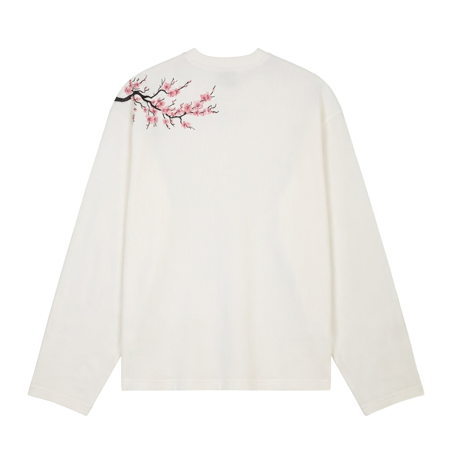White waffle long sleeve with embroidered blossom branch on the shoulder