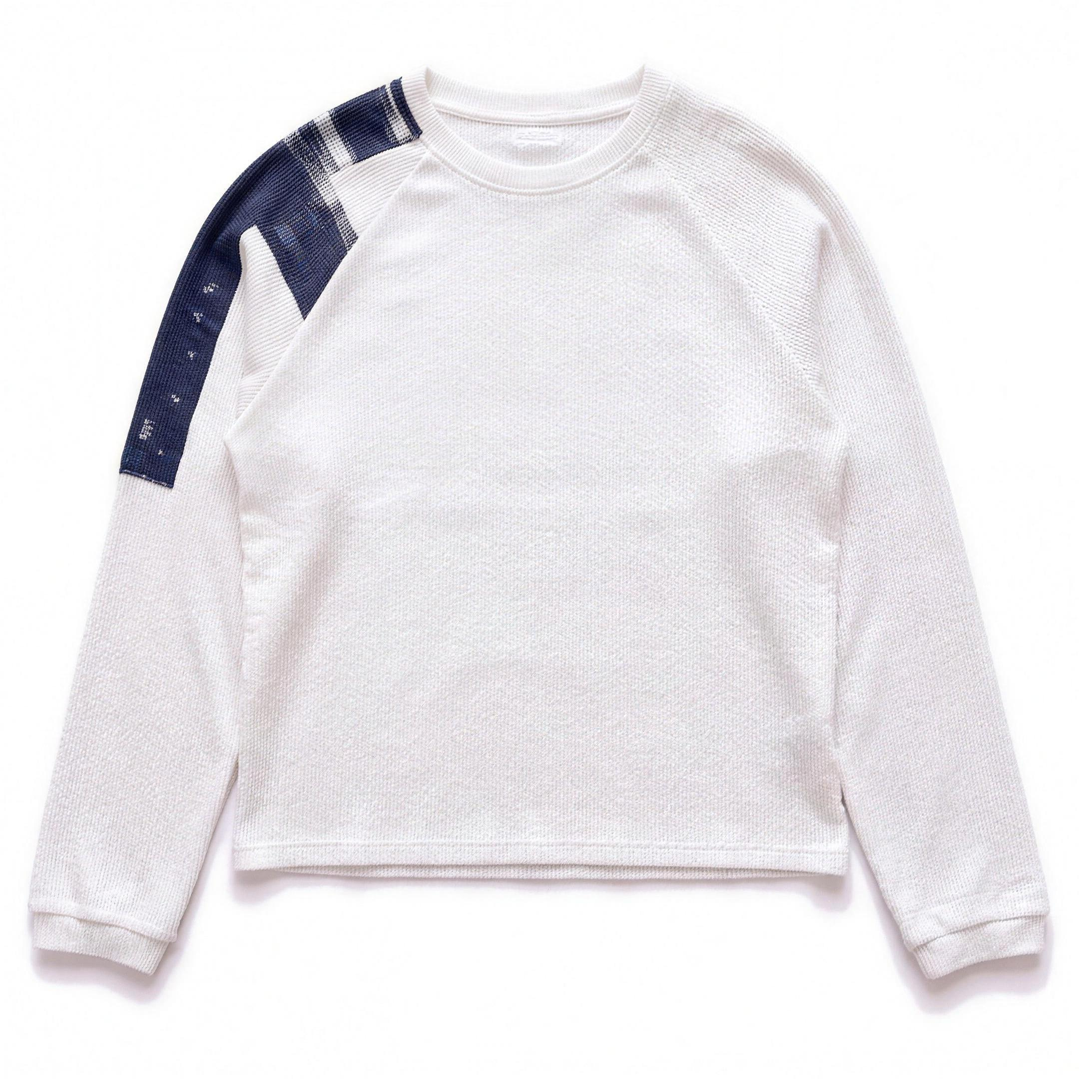 White waffle raglan long sleeve with navy painted shoulder stripe, flat lay