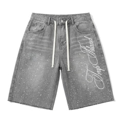 Script splatter denim shorts, front